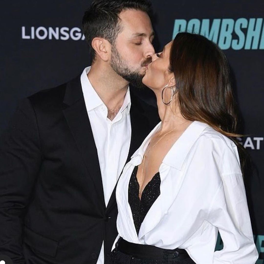 11 december: Oh what a night!! To say I’m proud to be a part of @bombshellmovie is an understatement. Thank you @lionsgate for including me ❤️ and thank you @ermannoscervino for creating such an AMAZING outfit for me to wear, @theory__ thanks for making my man look dapper. Styling: @livkhoury Hair: @josephchase Makeup: @emmawillismakeup Tap for credit
