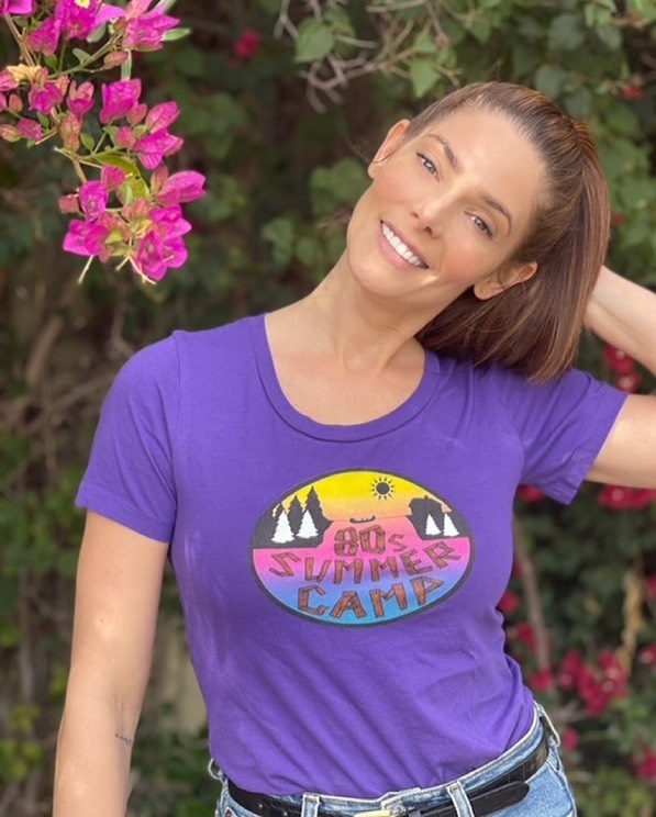 15 april 2021: Say hello to our Newest Camper! Welcome to Camp Ashley Greene Khourey!

Ashley is an actress/ model who you’ve seen in A Little Christmas Charm, Blackjack: The Jackie Ryan Story, Christmas on My Mind, Bombshell, Antiquities, Accident Man, Rogue, Shangri-La Suite, In Dubious Battle, Urge, Staten Island Summer, The Apparition, and of course the hugely popular Twilight Series as Alice, as well as many other projects.

Ashley is outgoing, loves the outdoors, and is an advocate for physical and mental wellness, as well as many other social issues and causes.

An AweSum bit of Trivia about Ashley is that Ashley is a self-confessed tomboy and "daredevil", and when she was younger, she loved to try to keep up with her older brother Joe, taking on activities such as taekwondo and winning several awards.

Ashley says she was not allowed to spar the girls in taekwondo class because she "beat the girls up". She even accidentally once gave a boy she liked a bloody nose and lip while sparring.

We think that’s AweSum, but it’s no surprise since Ashley is so outgoing and a great example of strength in her professional and personal lives.

We are super excited that you took the time to spread some awareness for mental health Ashley, and don’t forget..... YerAweSum!

Follow Ashley at @ashleygreene
For awesome posts and updates.

Tshirt provided by @empireatlantic in Corner Brook Newfoundland.

#Ashleygreene #mentalhealth #keithmuise #stephenville #newfoundland #80ssummercamp #YerAweSum #twilight
#tbt #picoftheday #pictureoftheday #tshirt #shirt #fashion #fashionstyle #fashionista #spring #summer #instadaily #instagood @twilight #sunny #style #instagram #twilightsaga
